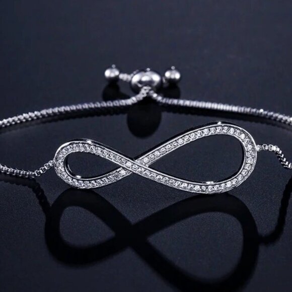 Jewelry bracelet infinity style white gold tone with stones sparkly adjustable - Picture 1 of 8